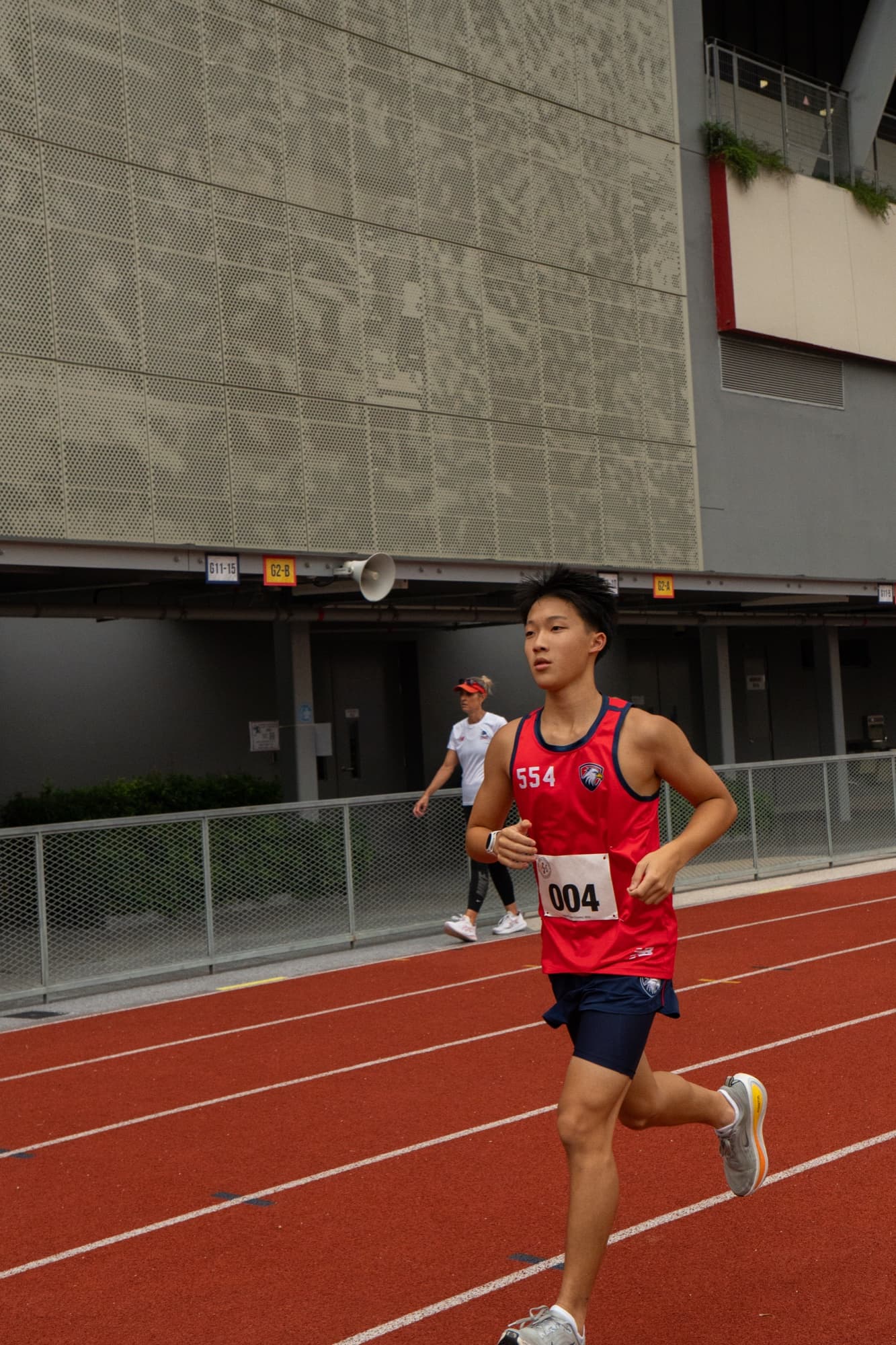 Sam racing at a track meet